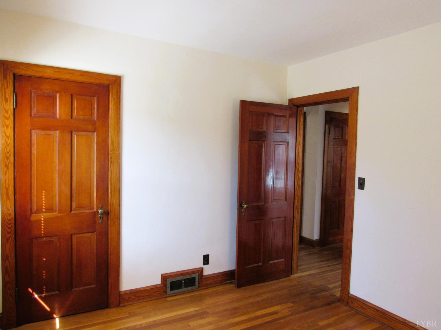 328 Huff Creek Trail Amherst, VA 24521 - Photo 22 of 41 an empty room with wooden floor and closet