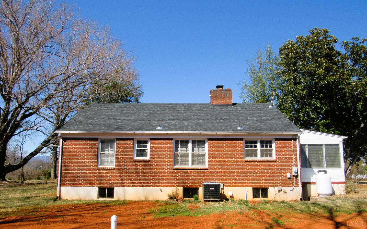 328 Huff Creek Trail Amherst, VA 24521 - Photo 3 of 41 a front view of a house with a yard