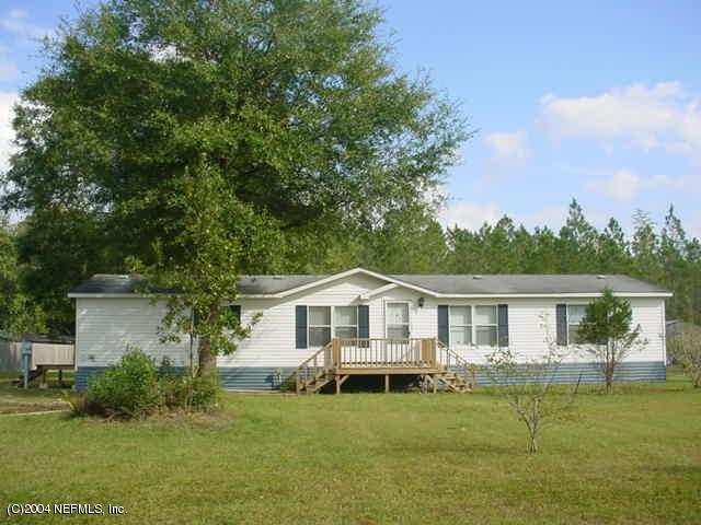 1561 Blair Road South Jacksonville, FL 32221 - Photo 1 of 5 a view of house with a garden