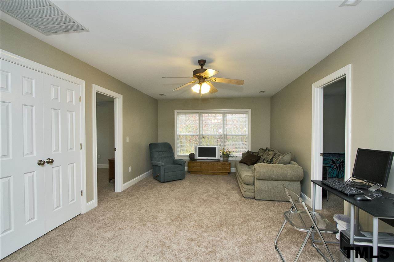 2012 Waterbrook Court Raleigh, NC 27603 - Photo 10 of 25 Extra-Large Bonus Room / Loft - This wonderful room is centrally located upstairs with all of the secondary bedrooms off of it. There is lots of light, a ceiling fan, and a large closet. Bonus Room