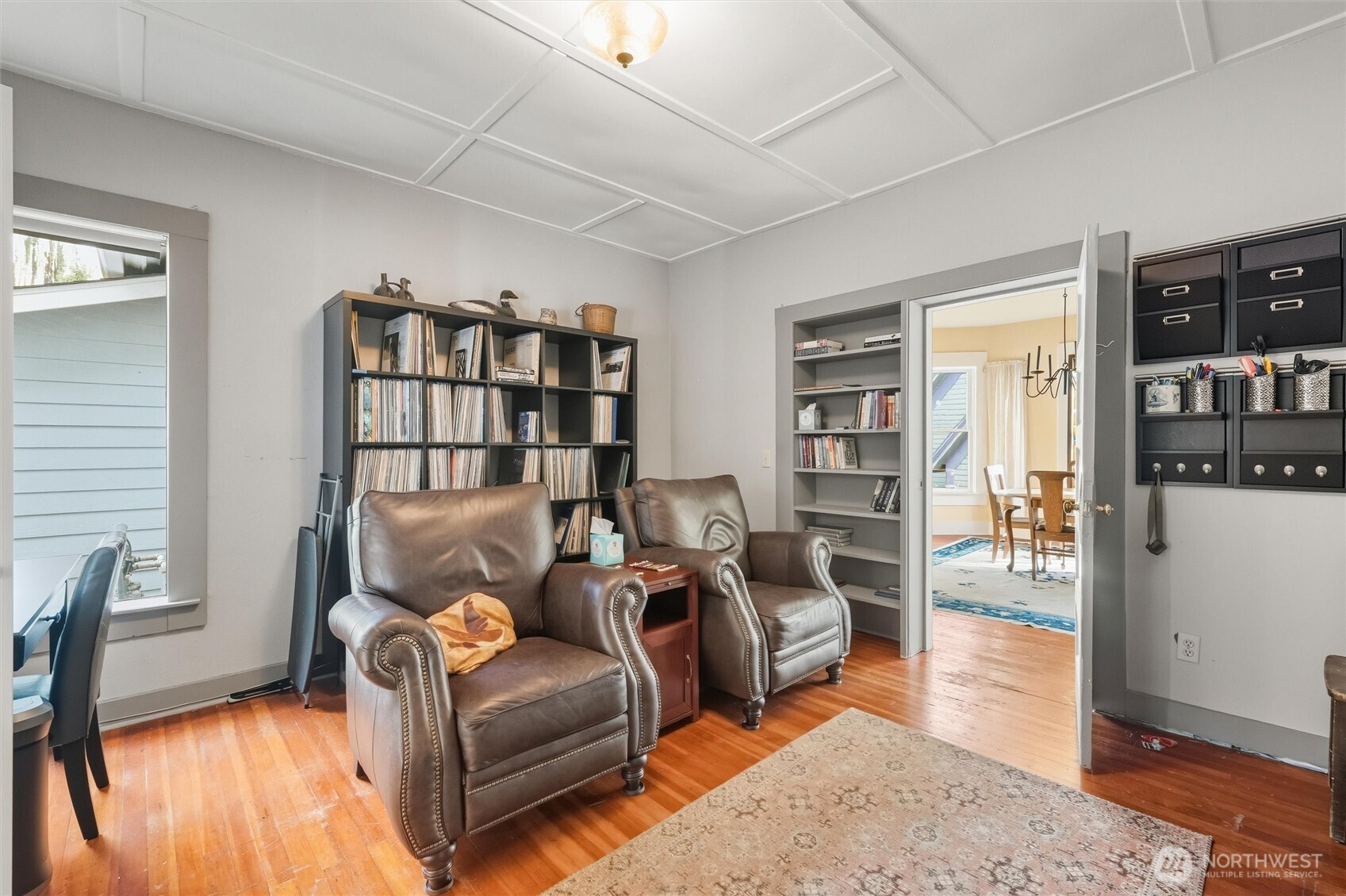 1131 16th Street Bellingham, WA 98225 - Photo 14 of 40 a living room with furniture and a book shelf