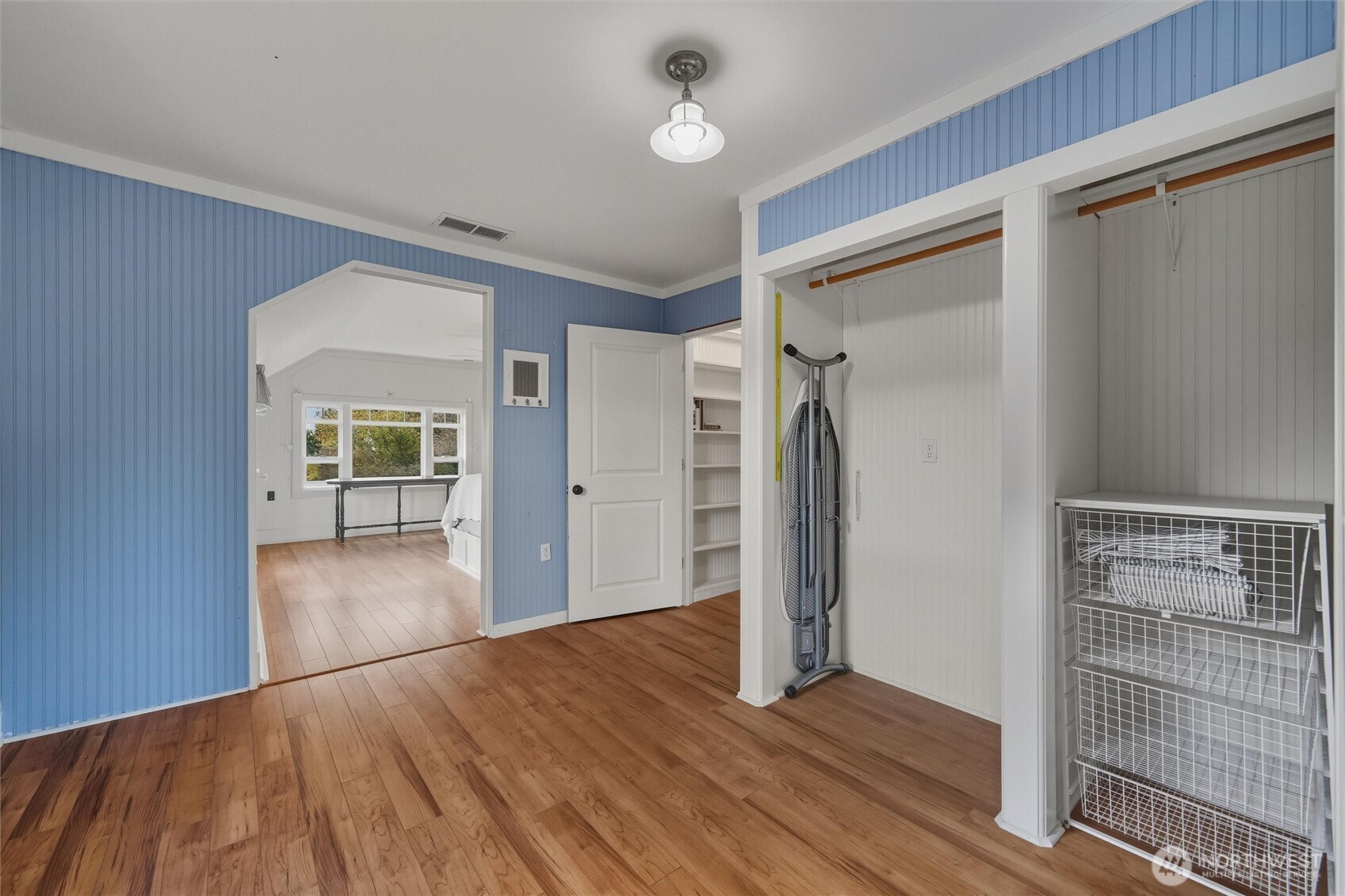 1131 16th Street Bellingham, WA 98225 - Photo 29 of 40 a view of empty room with wooden floor and fan