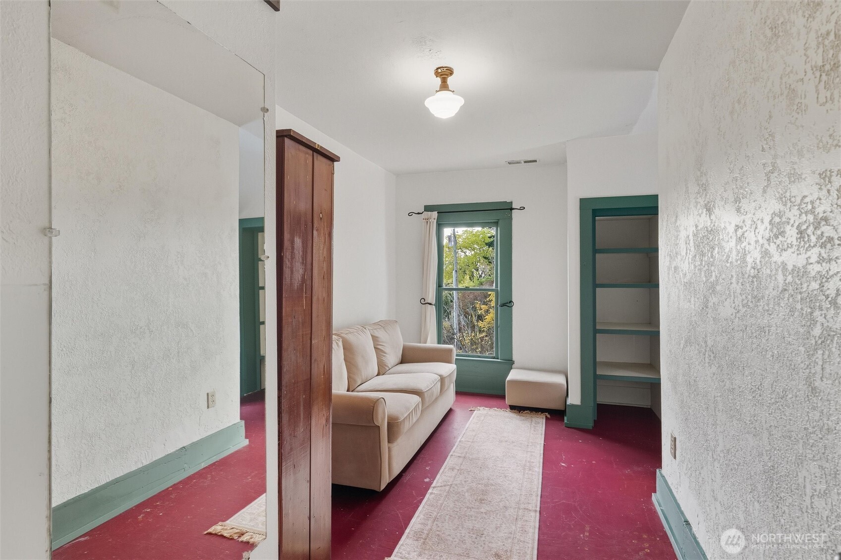 1131 16th Street Bellingham, WA 98225 - Photo 34 of 40 a bedroom with furniture and a window