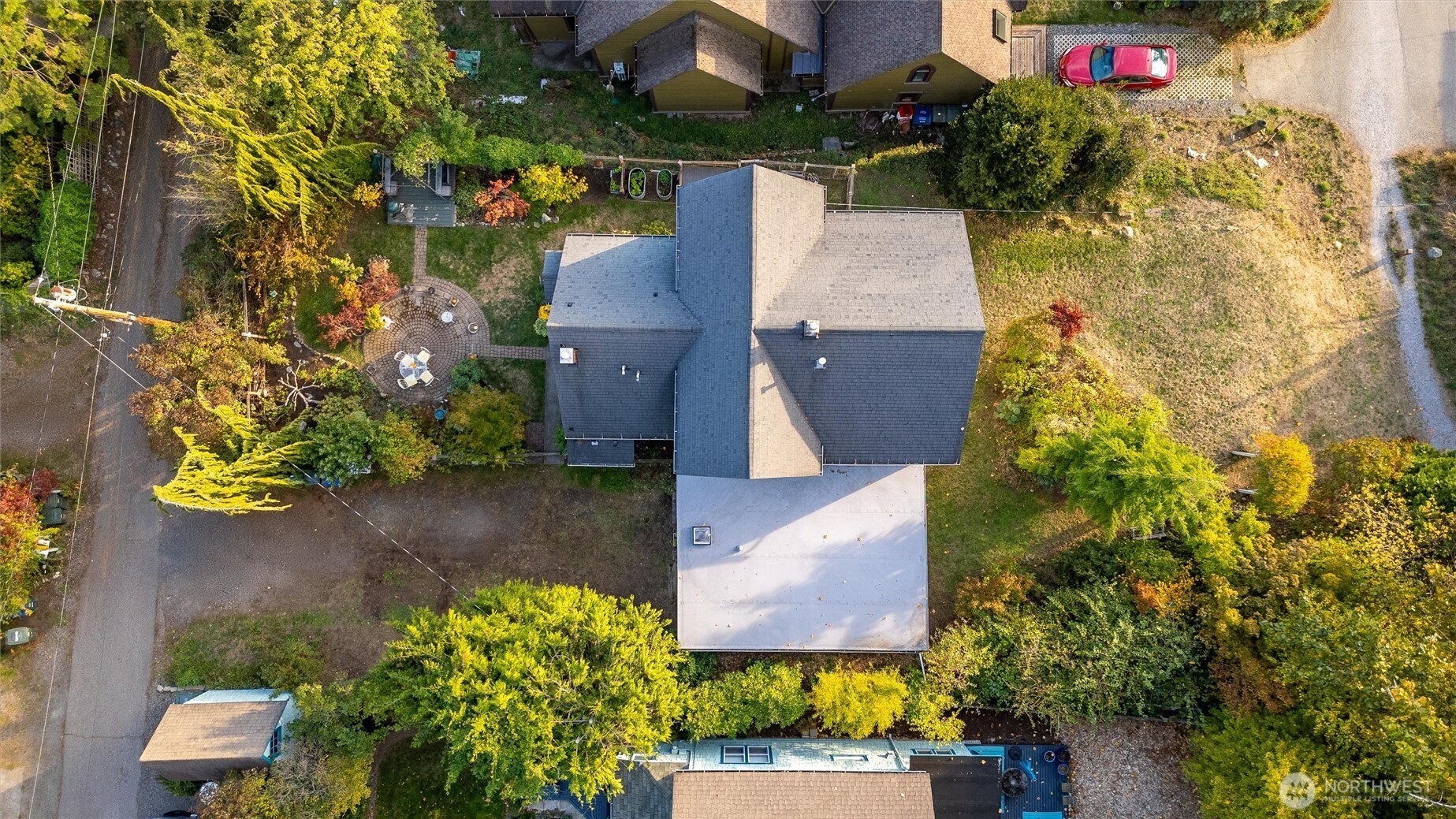 1131 16th Street Bellingham, WA 98225 - Photo 40 of 40 an aerial view of a house with a yard and a large tree