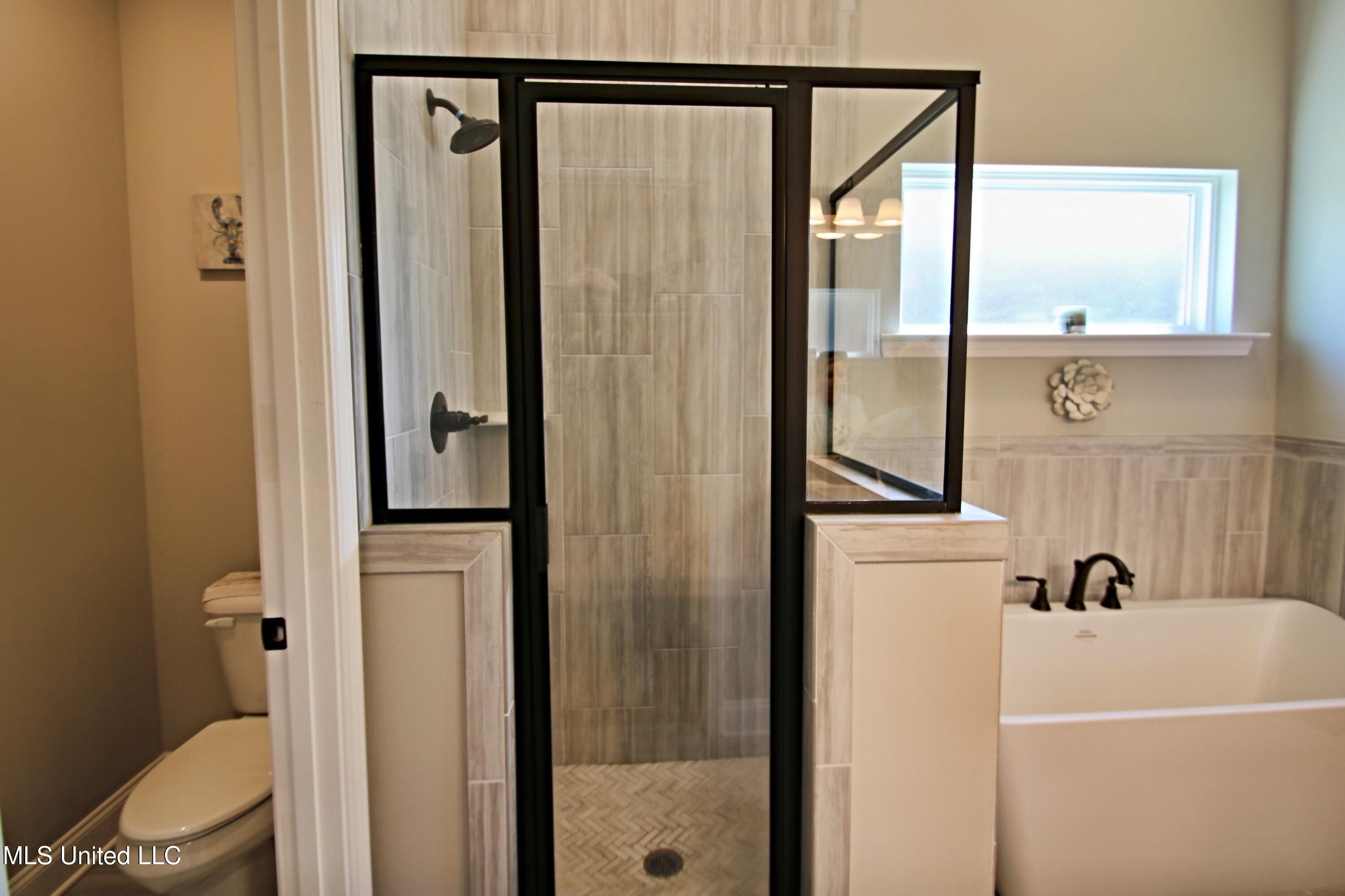 727 Holiday Cove Hernando, MS 38632 - Photo 13 of 26 Custom Tiled Walk in Shower