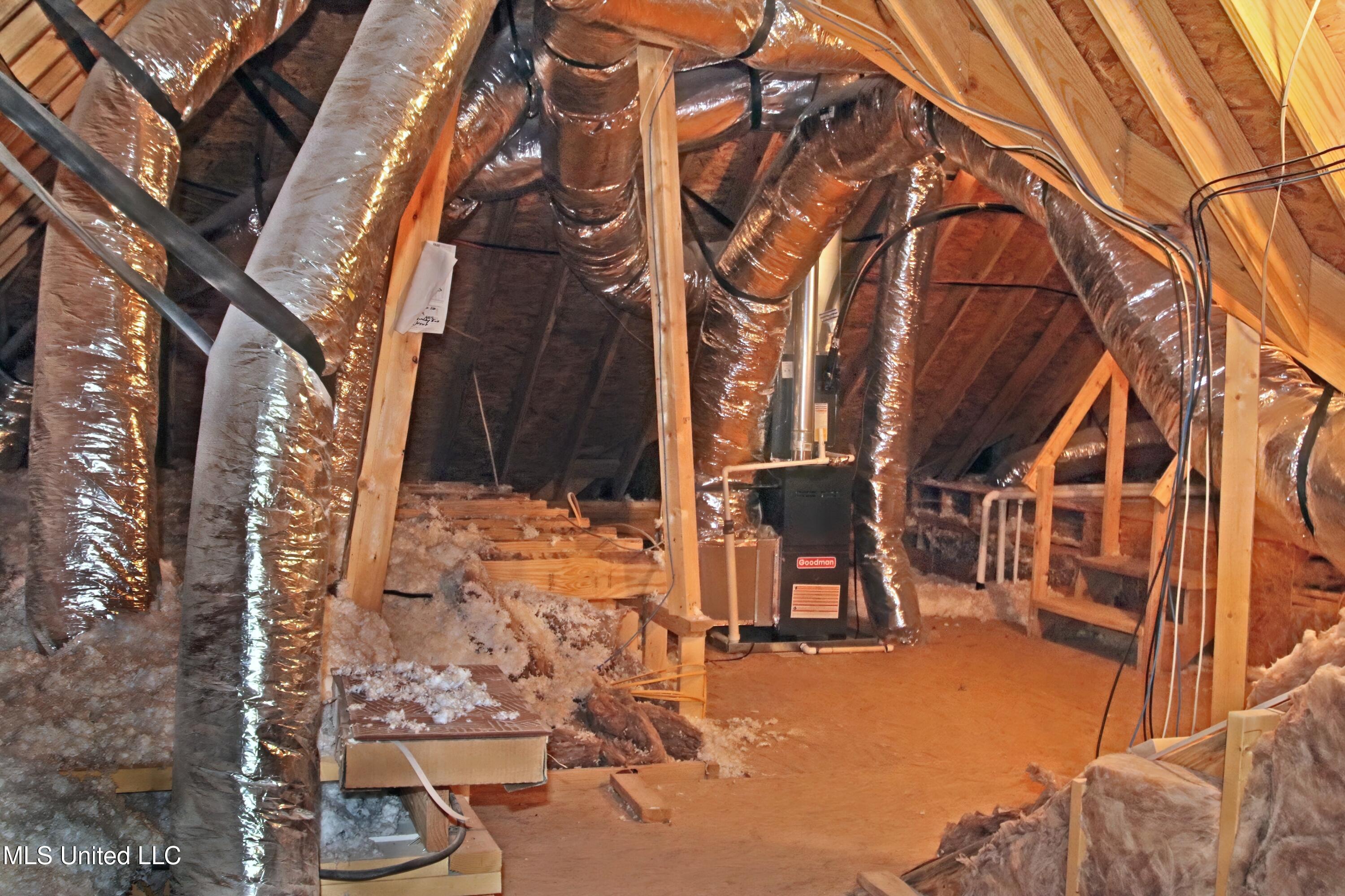 727 Holiday Cove Hernando, MS 38632 - Photo 23 of 26 Floored Attic