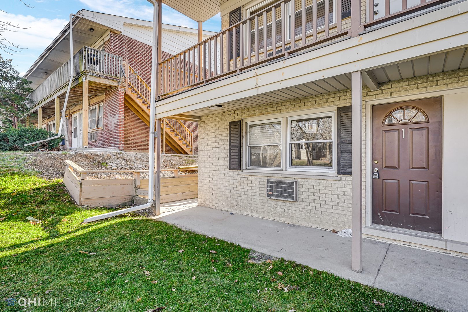 821 Bode Road, Unit 1 Elgin, IL 60120 - Photo 3 of 12 front view of a house with a view of a house