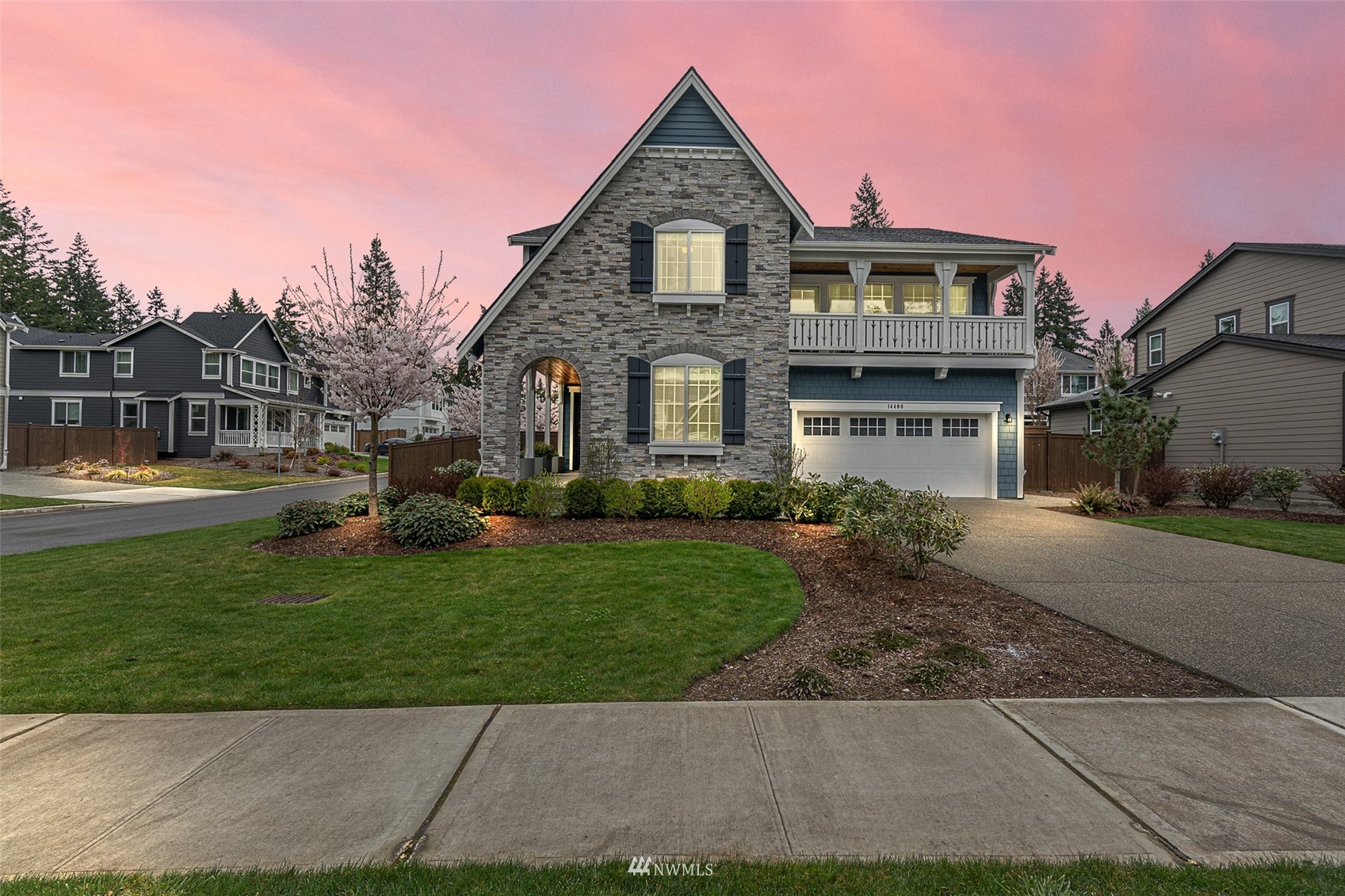 14408 160th Court Southeast Renton, WA 98059 - Photo 1 of 40 a front view of a house with a yard