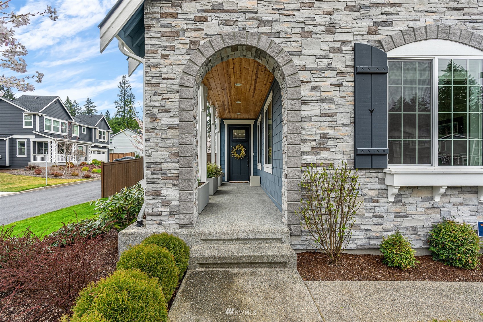 14408 160th Court Southeast Renton, WA 98059 - Photo 3 of 40 a front view of a house with garden
