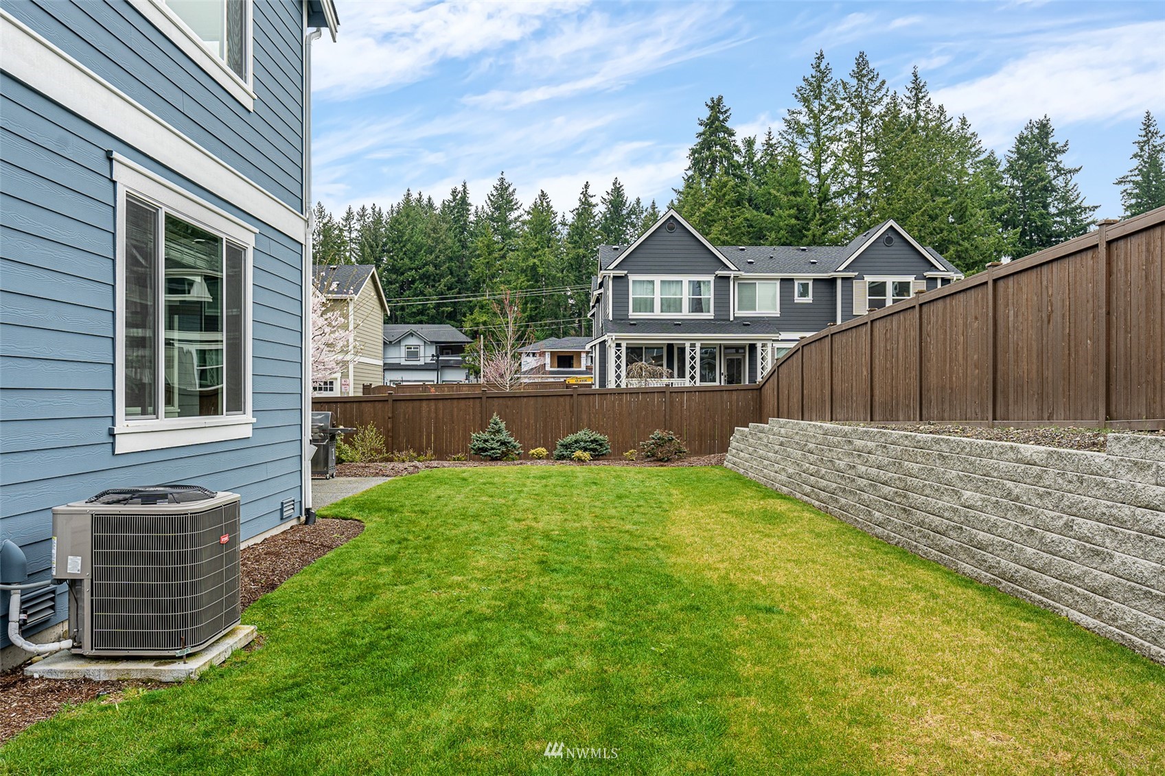 14408 160th Court Southeast Renton, WA 98059 - Photo 36 of 40 a front view of a house with a yard