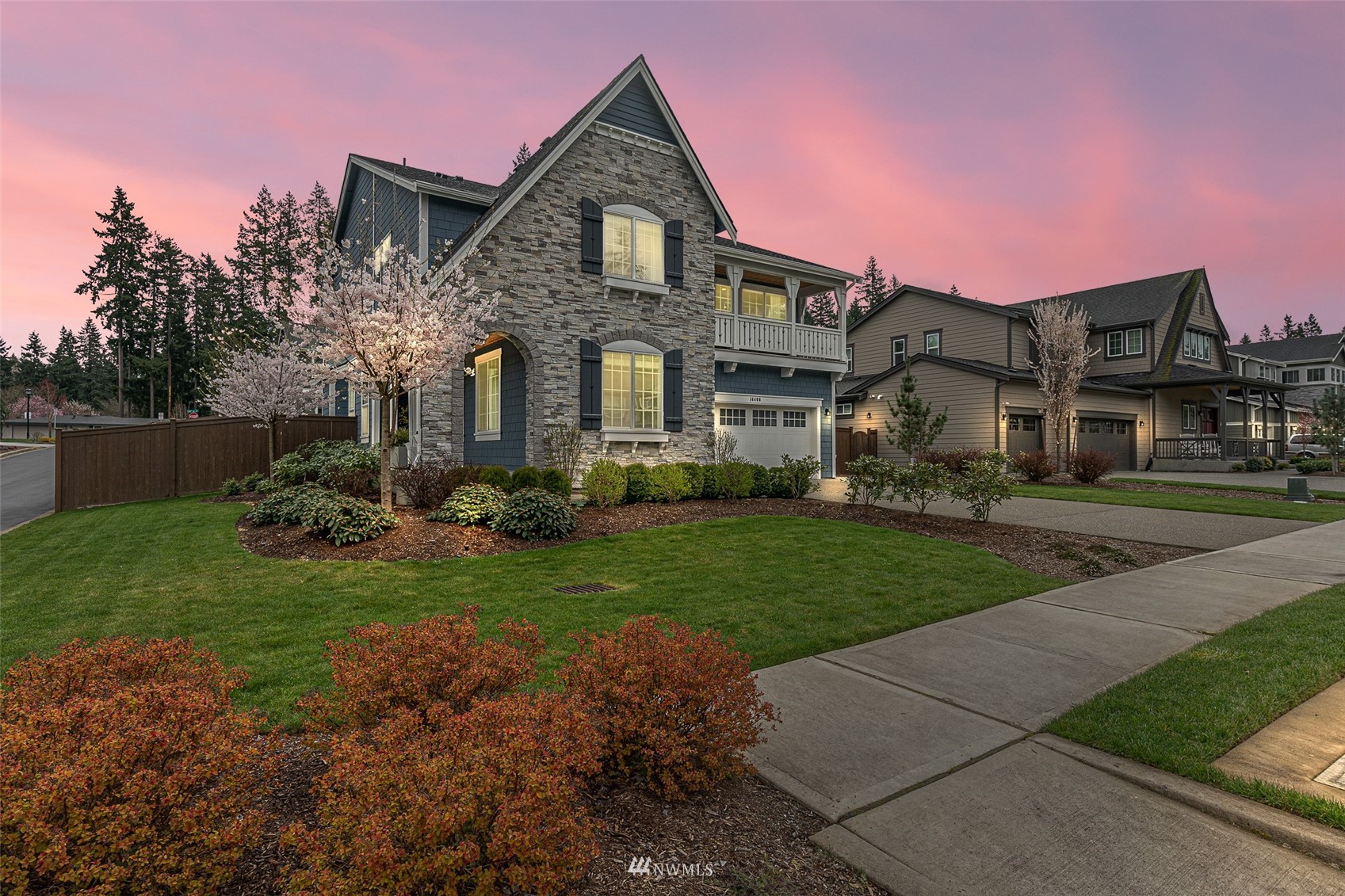 14408 160th Court Southeast Renton, WA 98059 - Photo 39 of 40 a front view of a house with a yard