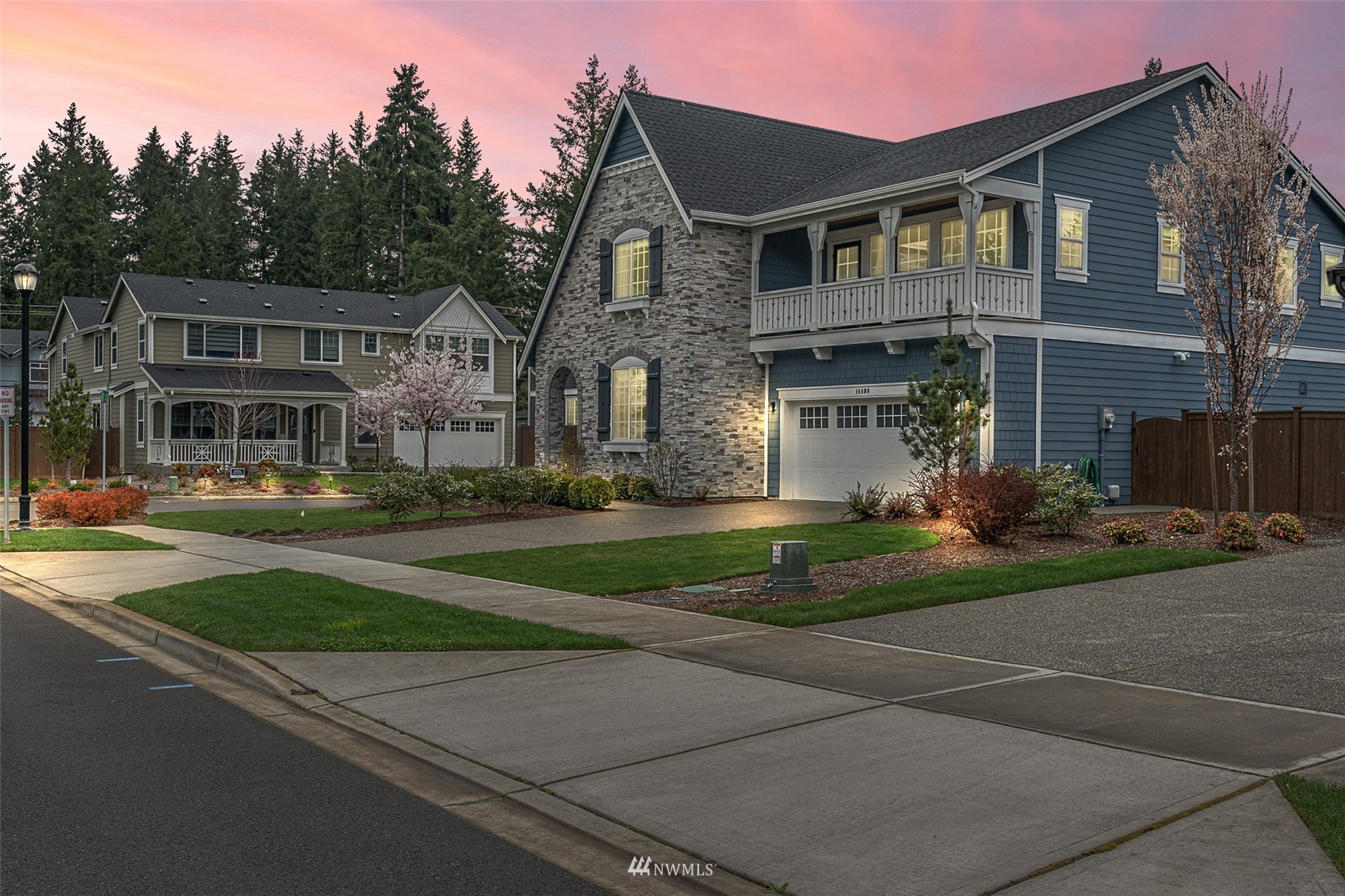 14408 160th Court Southeast Renton, WA 98059 - Photo 40 of 40 a front view of a house with a yard and garage