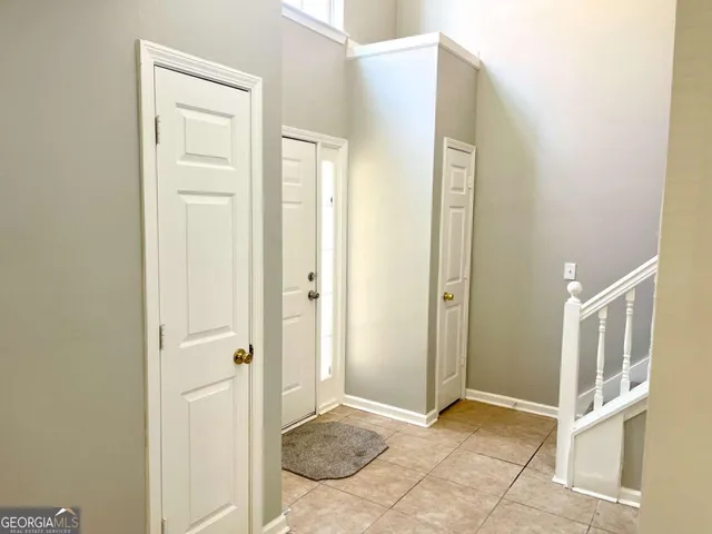 an empty room with windows