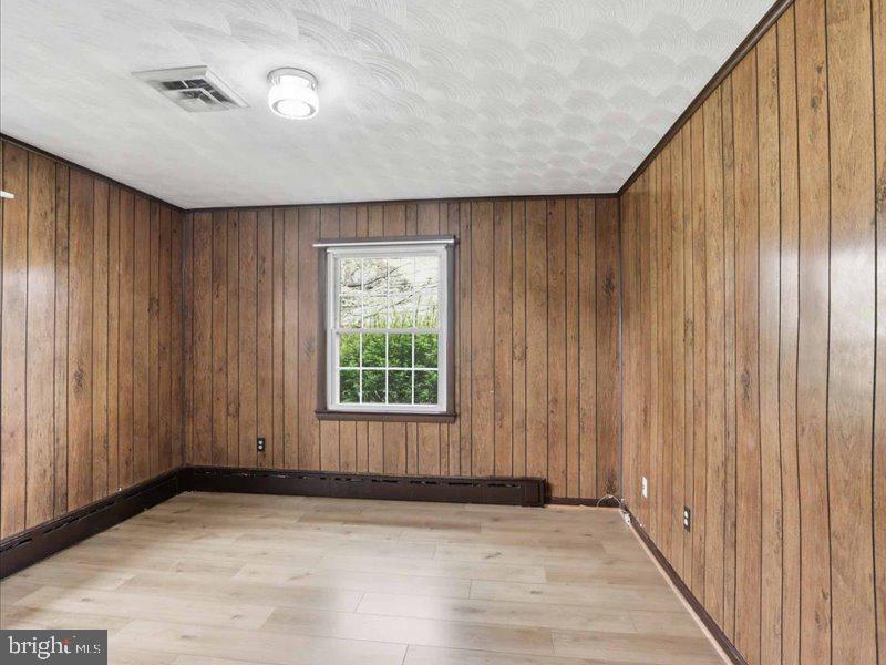 6404 Inwood Drive Springfield, VA 22150 - Photo 17 of 41 an empty room with windows
