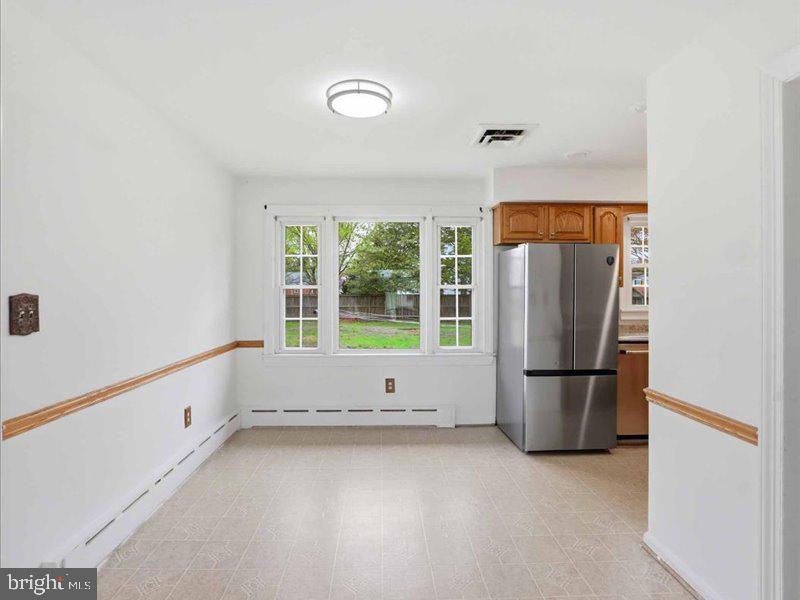 6404 Inwood Drive Springfield, VA 22150 - Photo 21 of 41 a view of room with window and refrigerator
