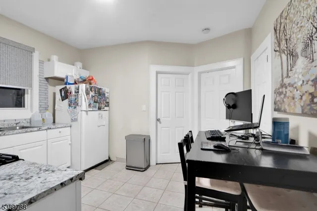 a view of a workspace with furniture