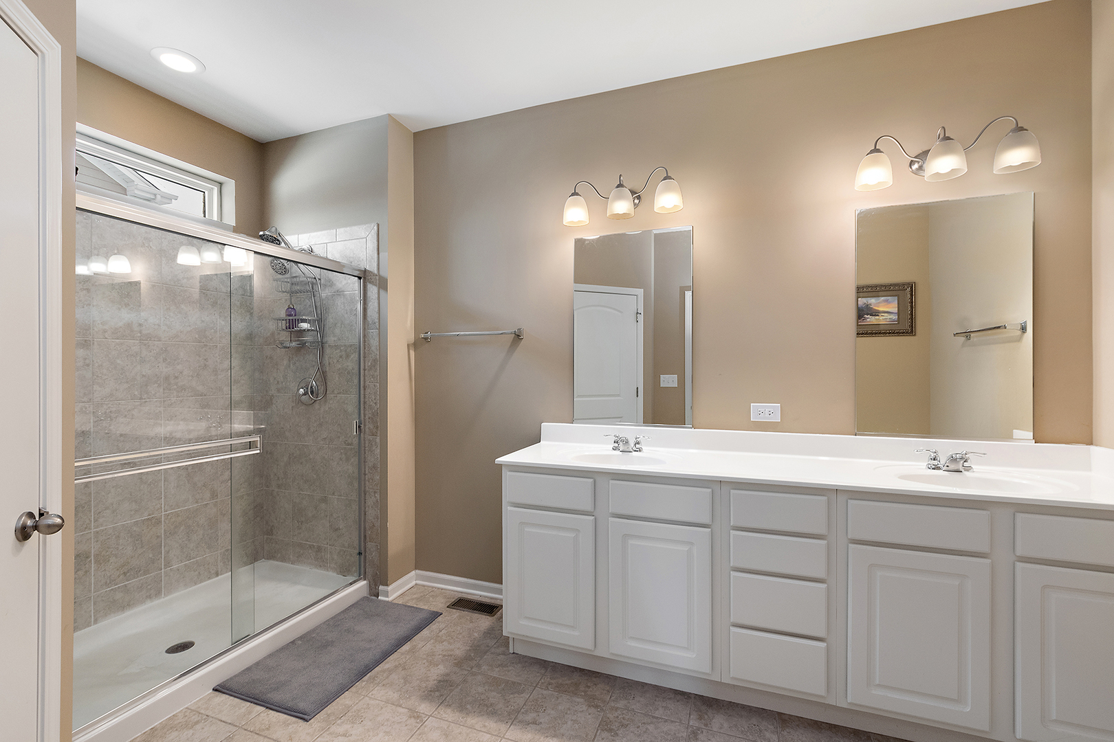 2073 Rownham Hill Road New Lenox, IL 60451 - Photo 17 of 34 a bathroom with a double vanity sink mirror and shower