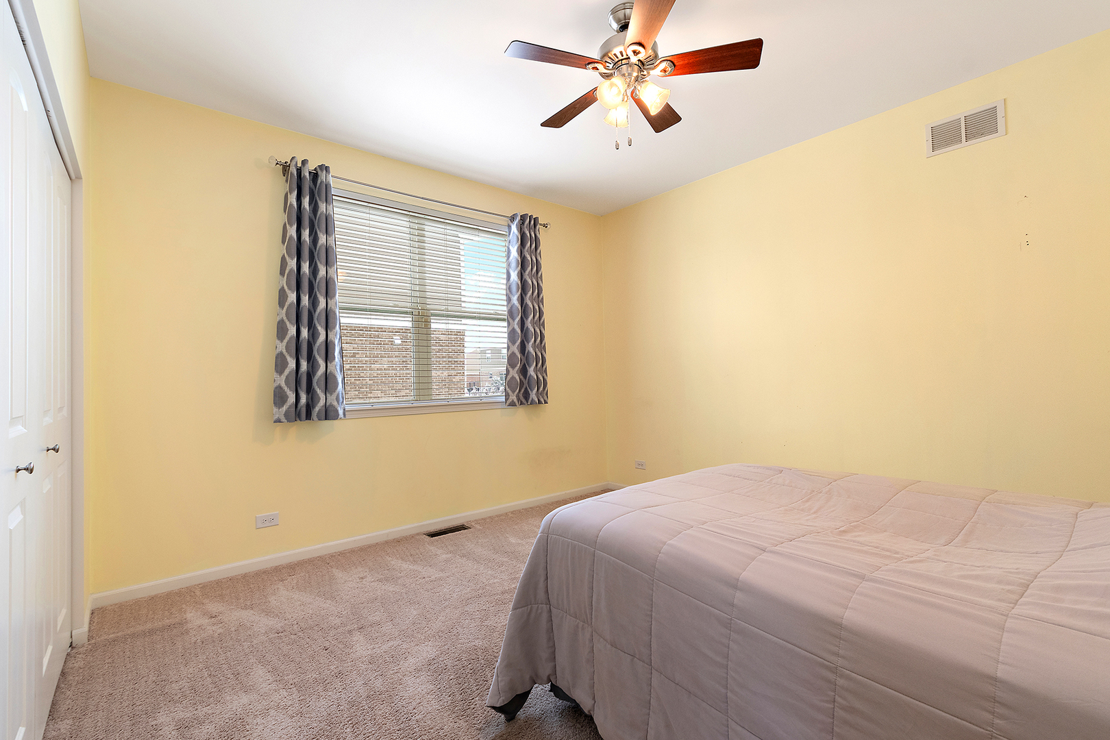2073 Rownham Hill Road New Lenox, IL 60451 - Photo 19 of 34 a bedroom with a bed and a window