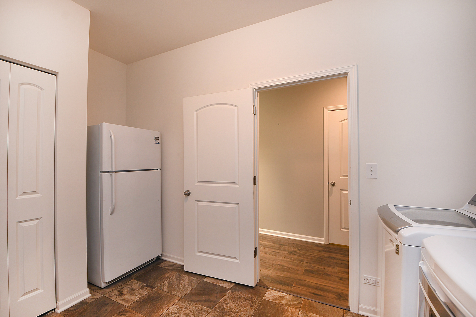 2073 Rownham Hill Road New Lenox, IL 60451 - Photo 23 of 34 a view of a storage & utility room with refrigerator