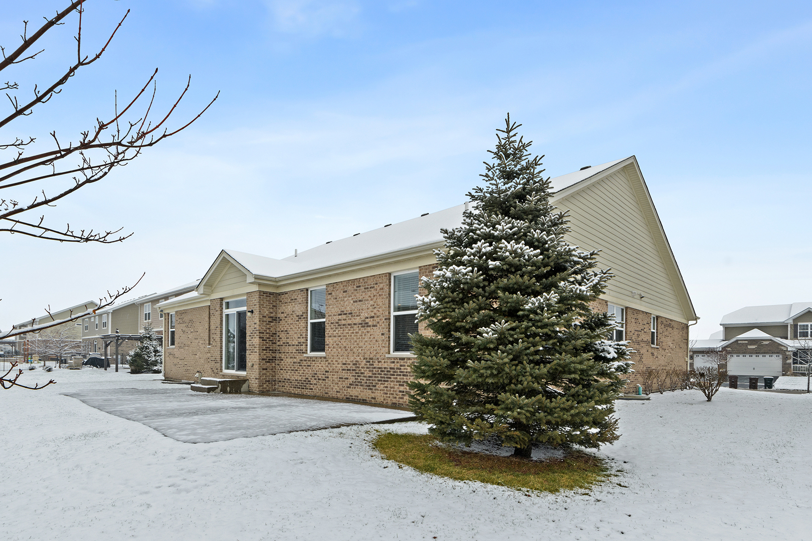 2073 Rownham Hill Road New Lenox, IL 60451 - Photo 28 of 34 a front view of a house with garden
