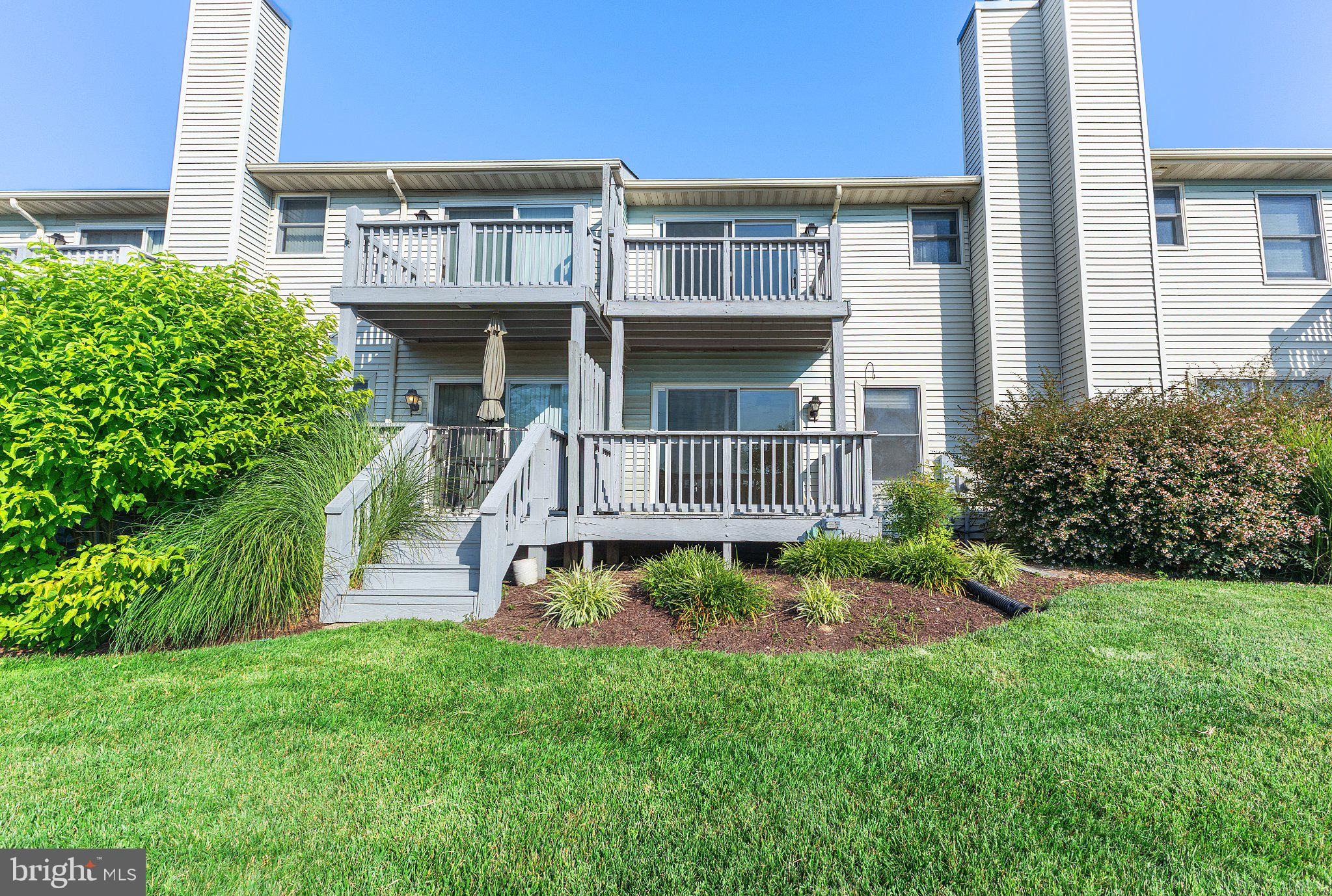 106 Bodys Neck Road Chester, MD 21619 - Photo 41 of 46 Charming townhouse with lush greenery.