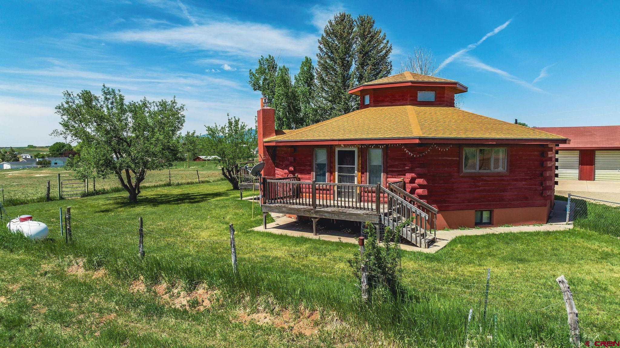 24816 Rd M.3 Cortez, CO 81321 - Photo 2 of 34 a view of a house with a yard