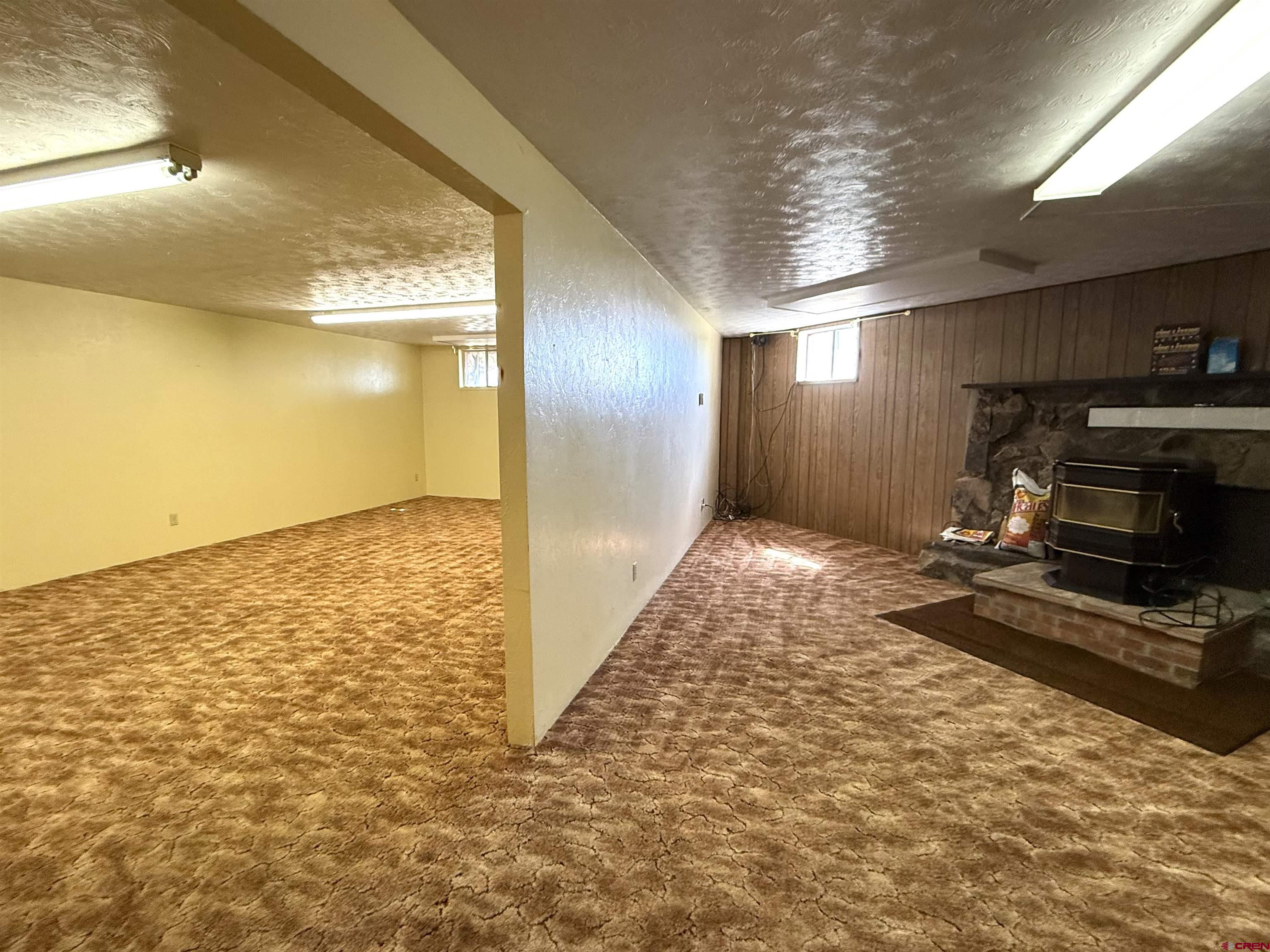 24816 Rd M.3 Cortez, CO 81321 - Photo 26 of 34 a view of a livingroom with an empty space and a window