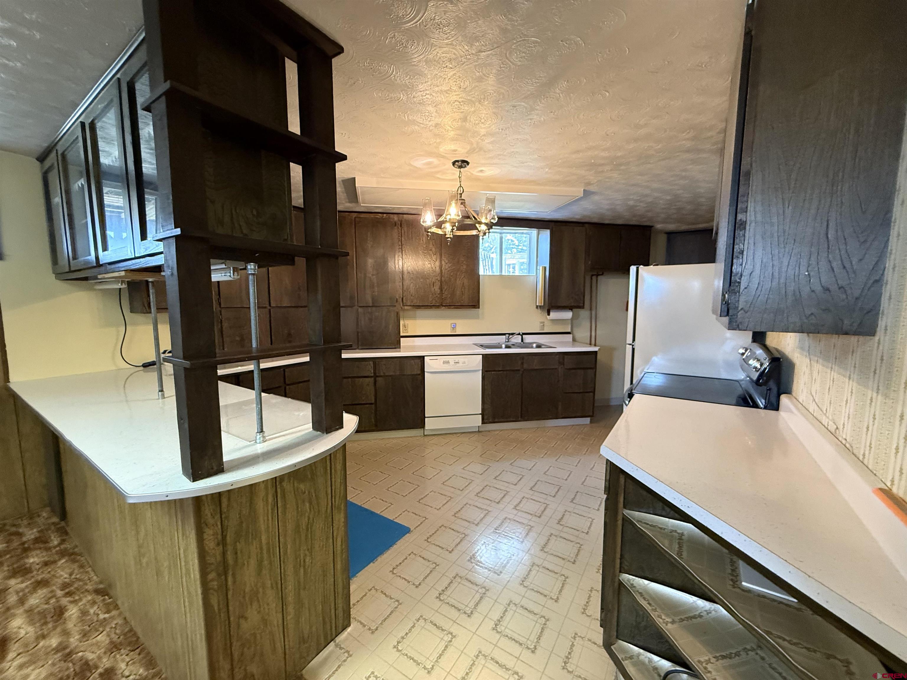 24816 Rd M.3 Cortez, CO 81321 - Photo 27 of 34 a kitchen with stainless steel appliances granite countertop a sink stove and refrigerator