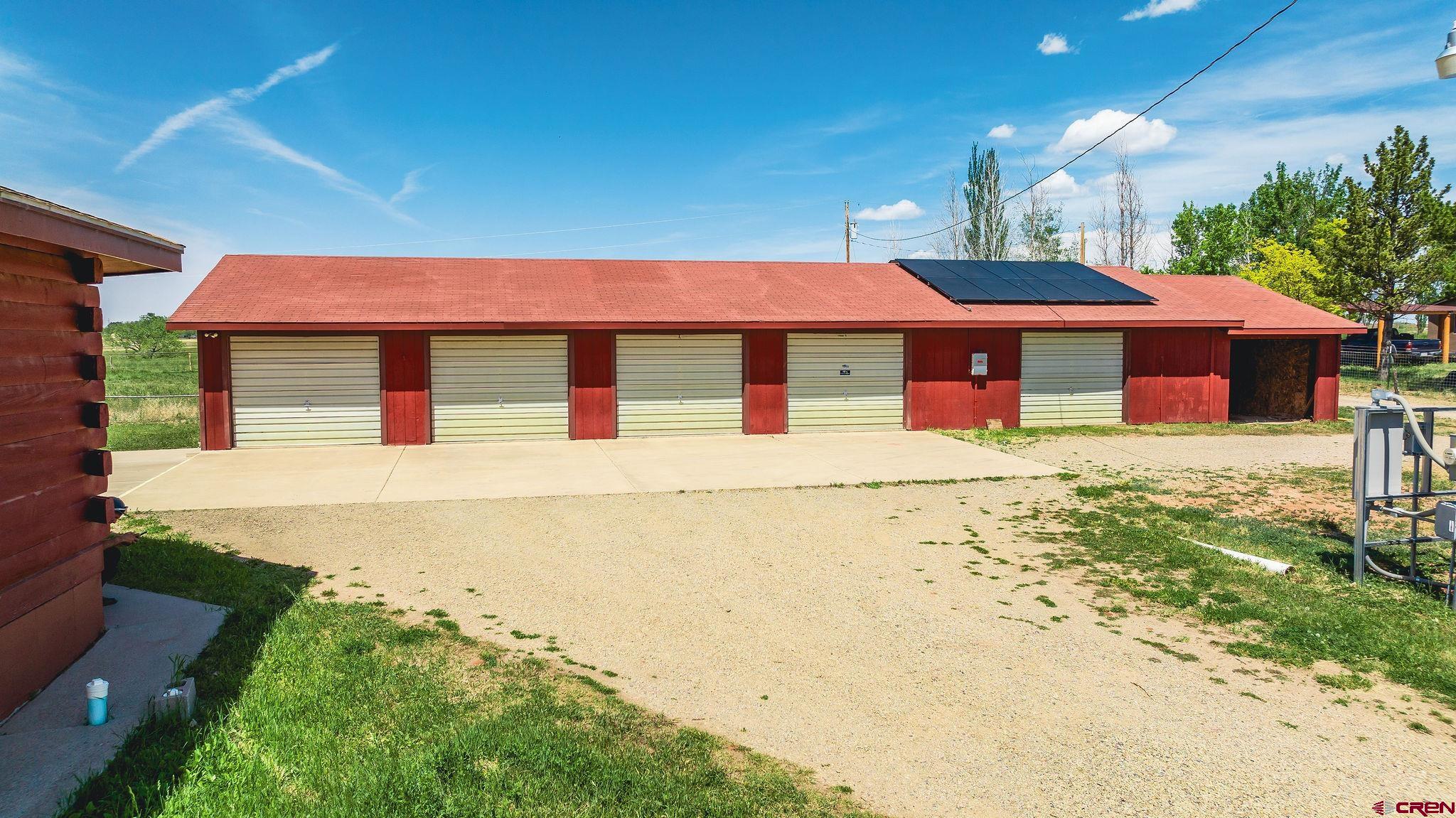 24816 Rd M.3 Cortez, CO 81321 - Photo 6 of 34 front view of a house with a yard
