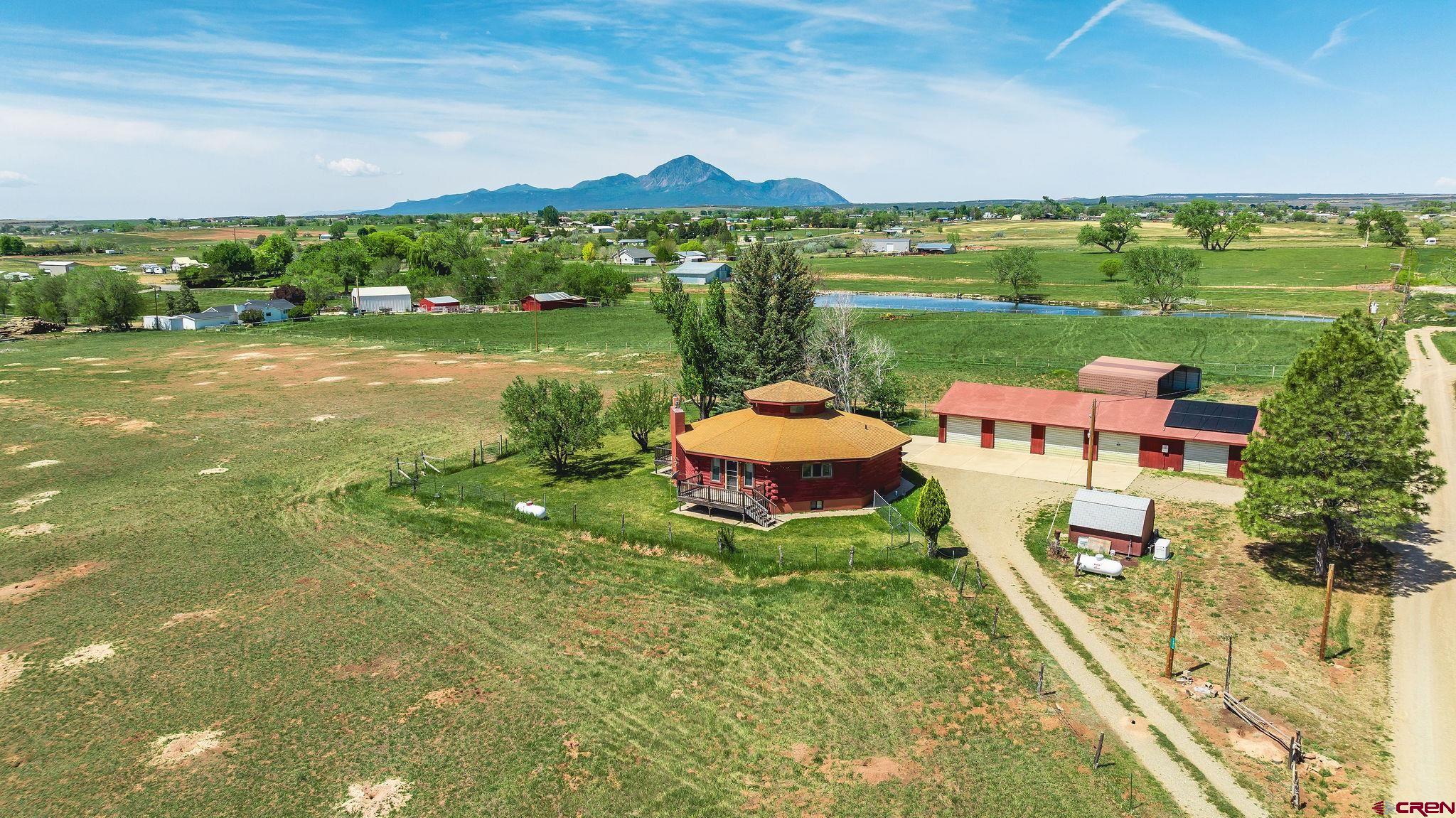 24816 Rd M.3 Cortez, CO 81321 - Photo 7 of 34 a view of a lake with a mountain in the back