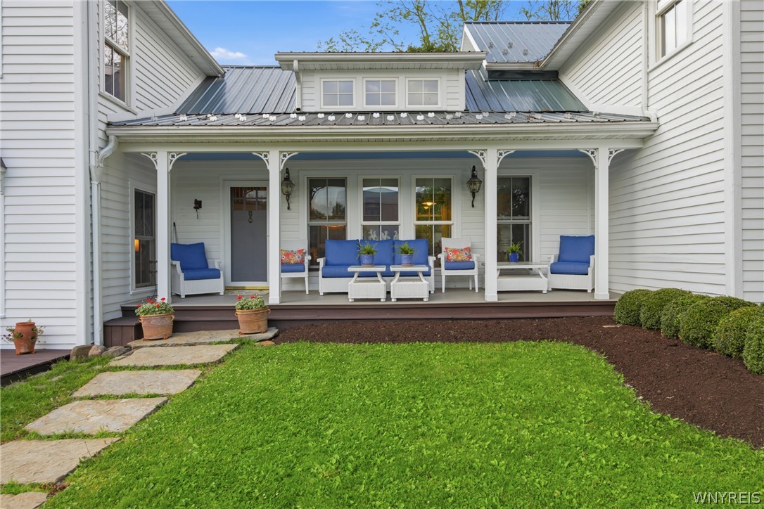 9788 Clarksburg Road Eden, NY 14057 - Photo 2 of 49 Beautiful side porch with ample seating