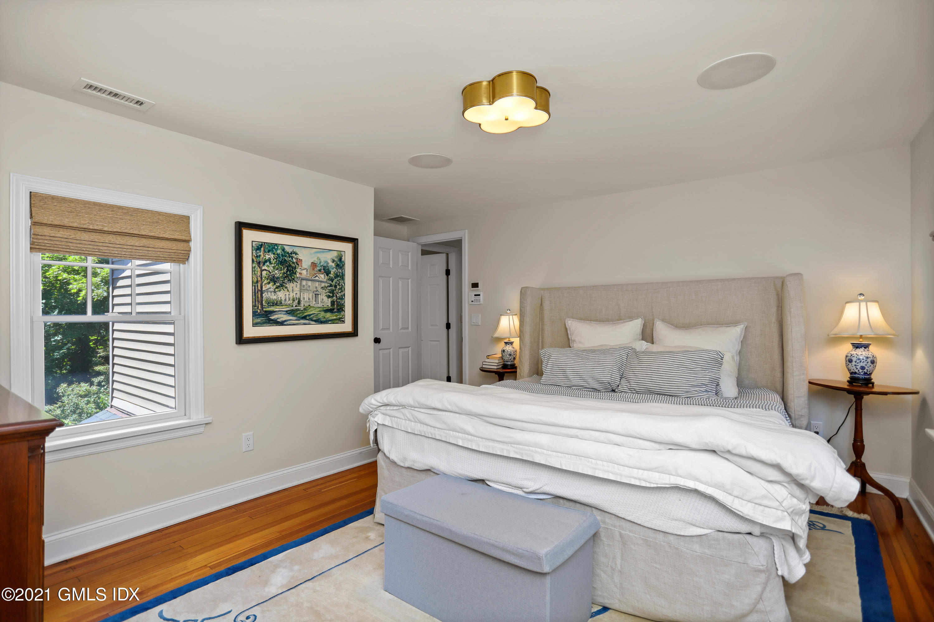 20 Ridge Road Cos Cob, CT 06807 - Photo 17 of 31 a bedroom with a bed and a window
