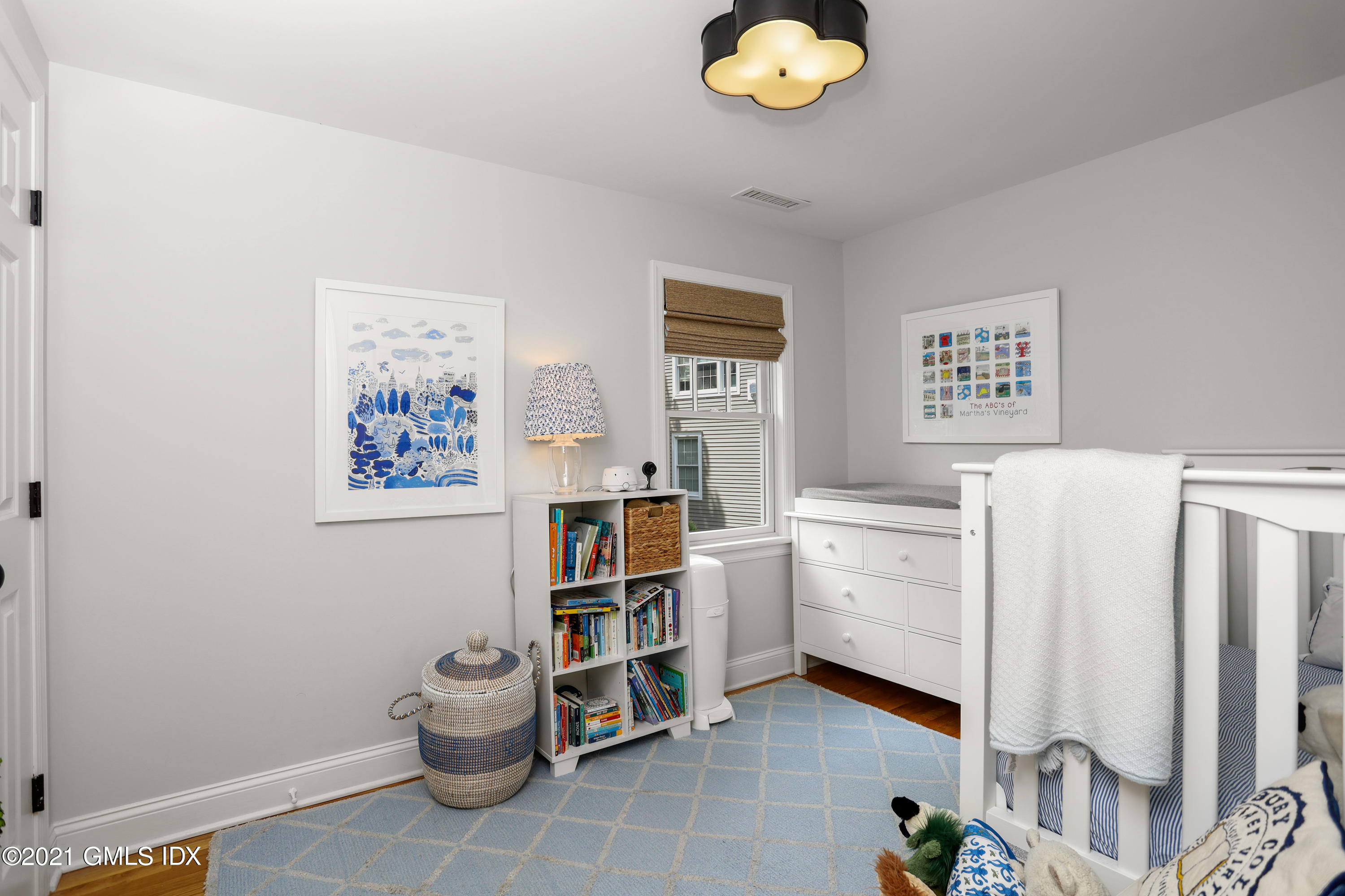 20 Ridge Road Cos Cob, CT 06807 - Photo 20 of 31 a room with cabinets and dust bin