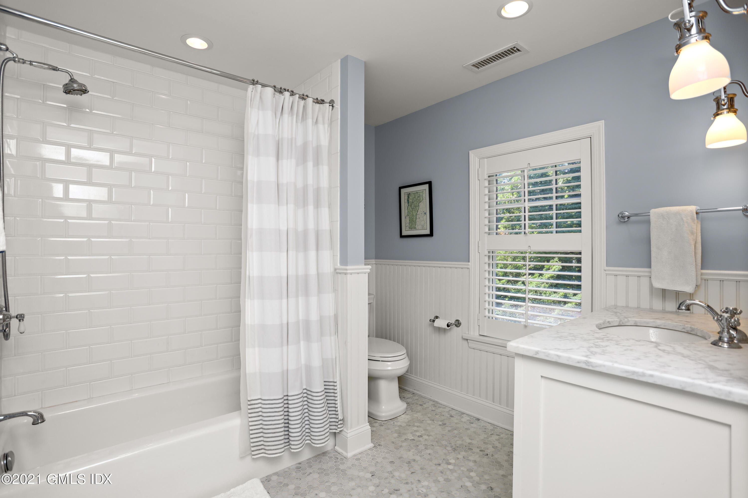 20 Ridge Road Cos Cob, CT 06807 - Photo 22 of 31 a bathroom with a granite countertop sink a toilet and shower