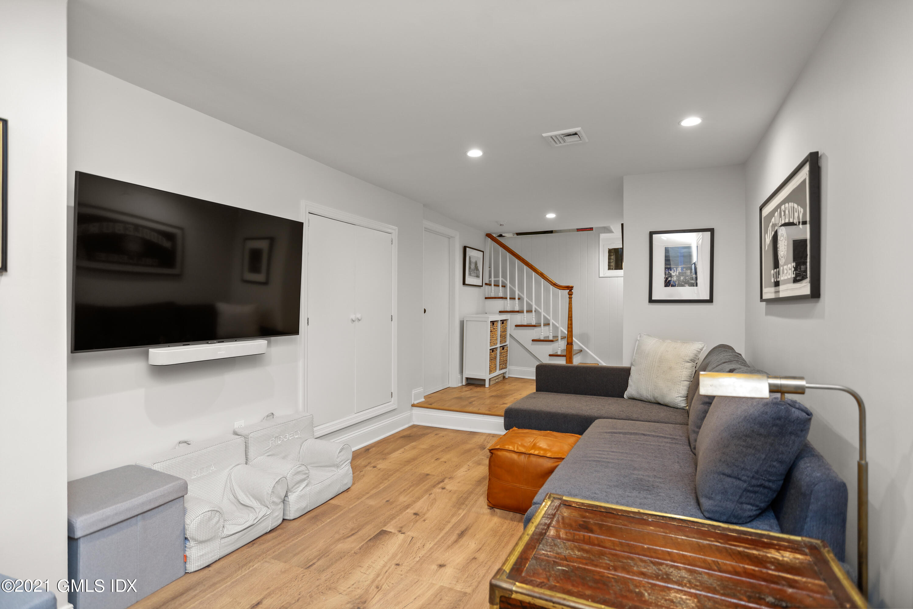 20 Ridge Road Cos Cob, CT 06807 - Photo 24 of 31 a living room with furniture and a flat screen tv