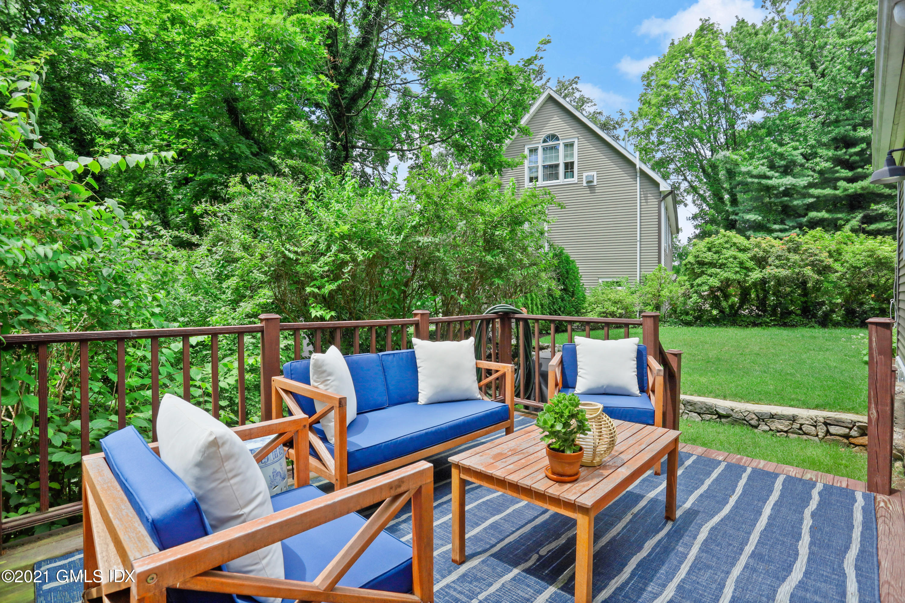 20 Ridge Road Cos Cob, CT 06807 - Photo 26 of 31 a view of deck with furniture and garden