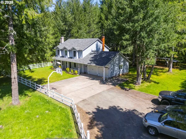 a view of a house with swimming pool and porch