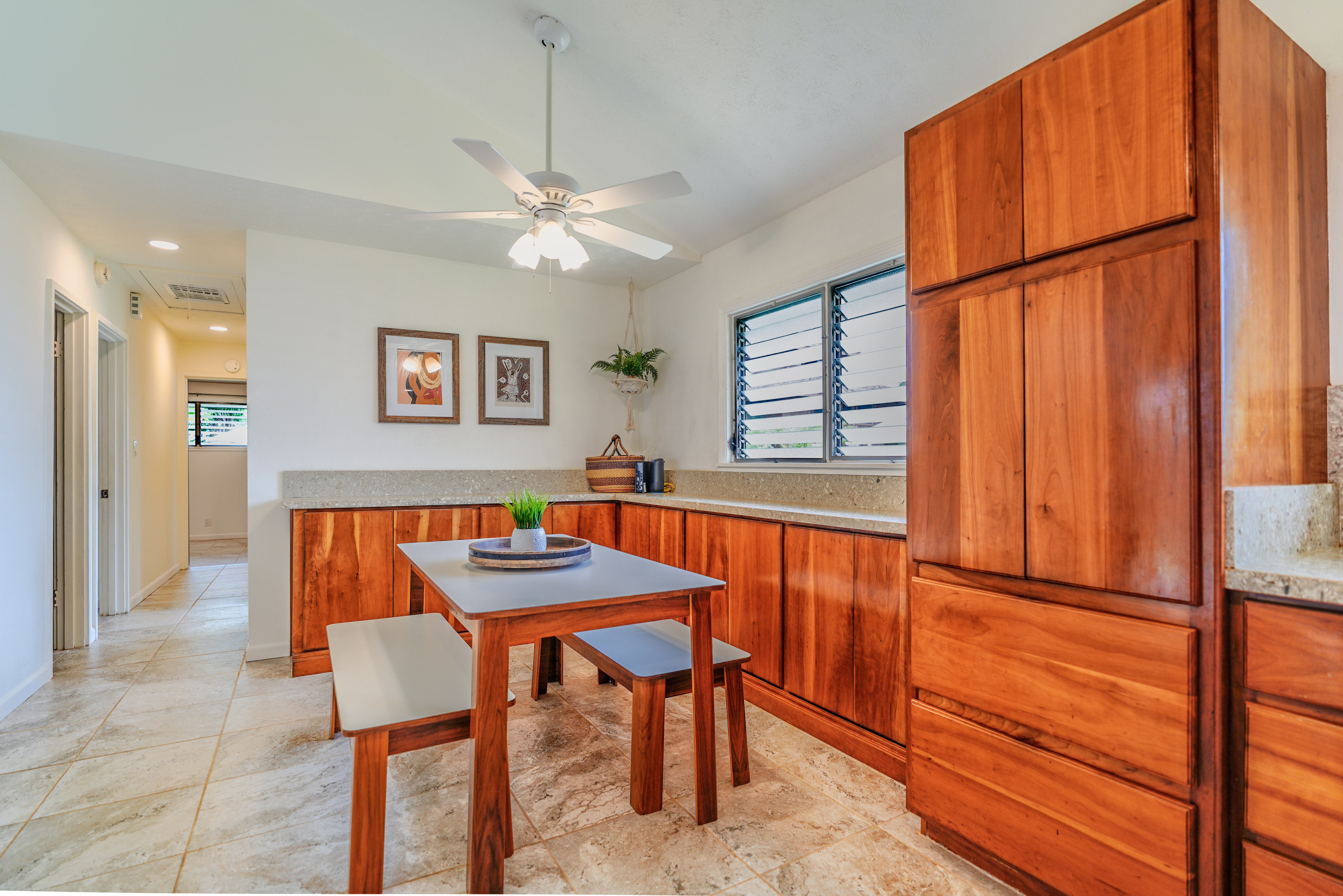316 A Makani Road, Unit A Kapaa, HI 96746 - Photo 6 of 29 a dining room with furniture and a window
