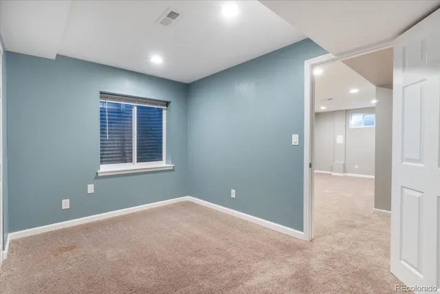 a view of road with large house