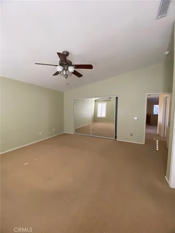 a view of a livingroom with a ceiling fan