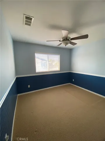 en view of an empty room with a window