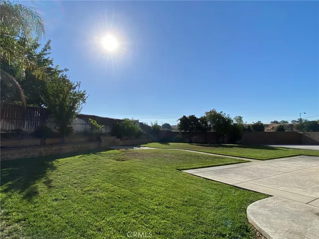 a view of a golf course with a lake
