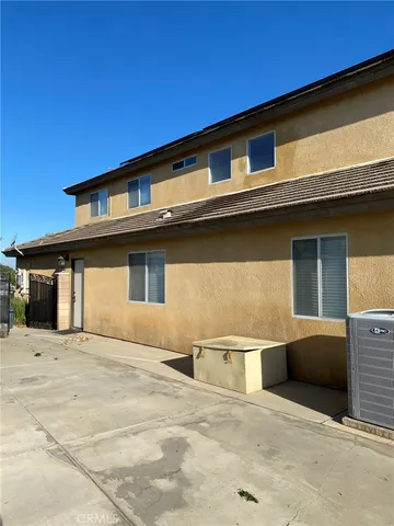 a front view of a house with a garage