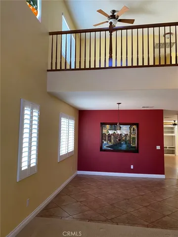a view of a living room and window