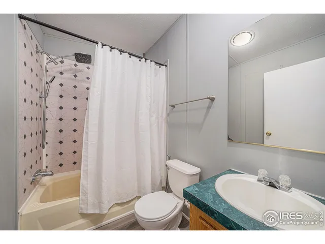 a bathroom with a sink toilet a shower and a bathtub
