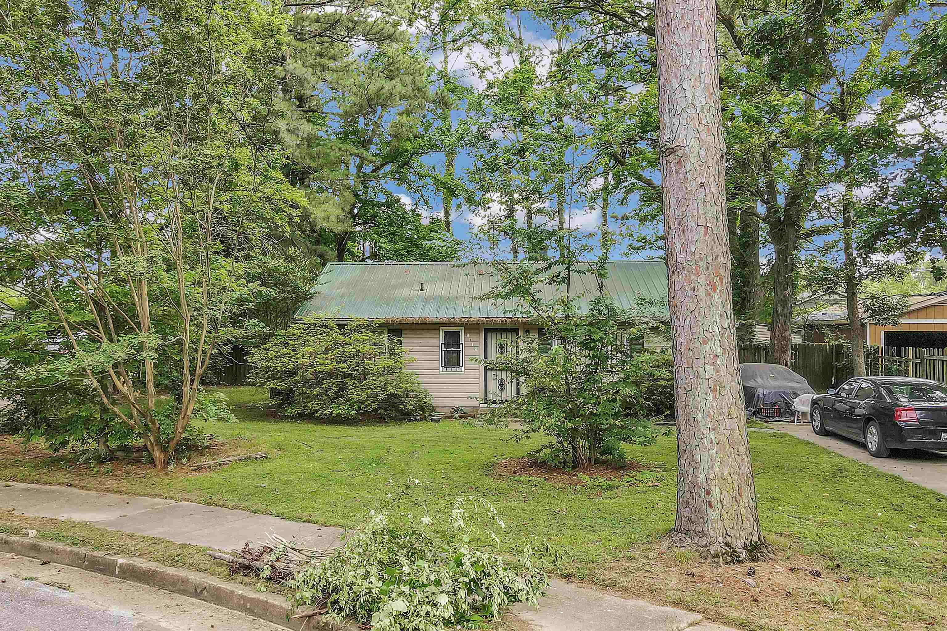 1013 Par Avenue Memphis, TN 38127 - Photo 1 of 1 a view of a house with a tree in the background