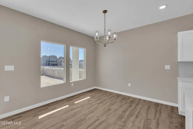 a view of cabinets with wooden floor