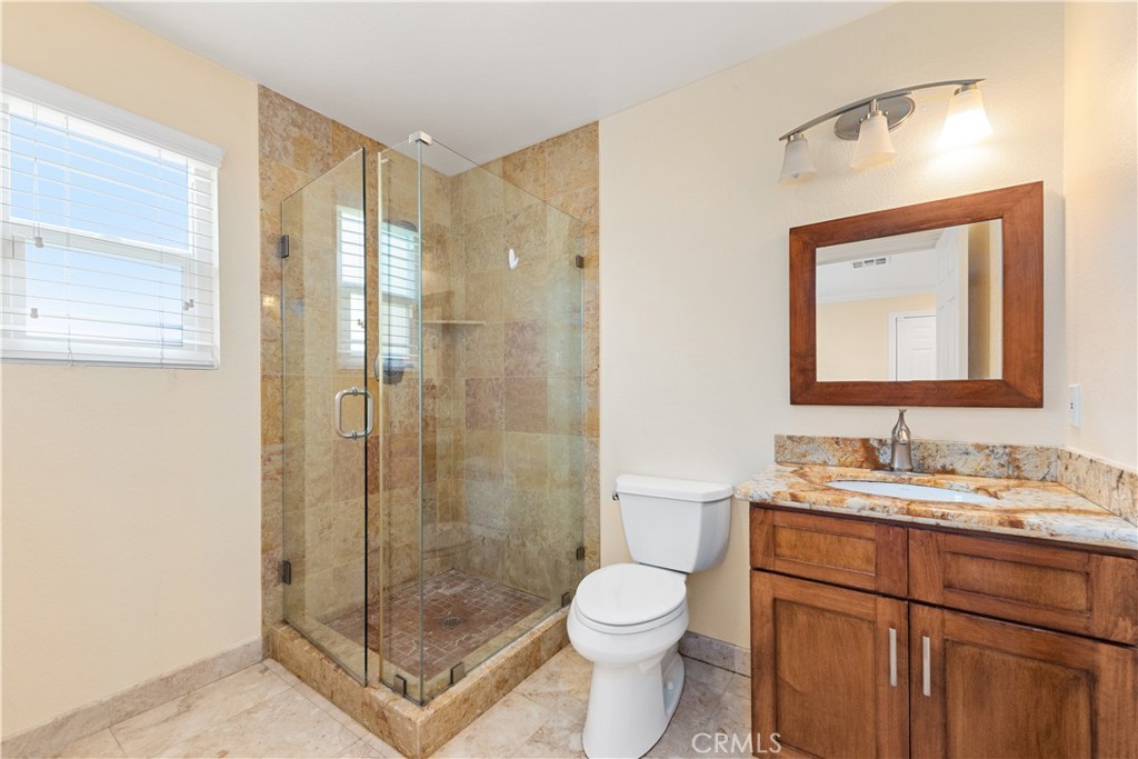 21236 Greenbrook Drive Walnut, CA 91789 - Photo 34 of 49 a bathroom with a sink a toilet and shower