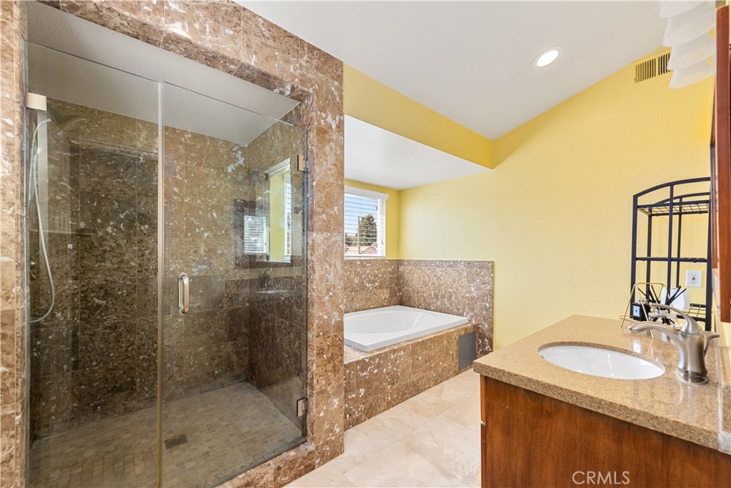 21236 Greenbrook Drive Walnut, CA 91789 - Photo 42 of 49 a bathroom with a granite countertop sink and a mirror