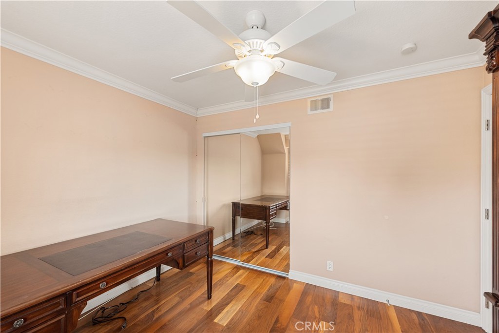 21236 Greenbrook Drive Walnut, CA 91789 - Photo 47 of 49 a view of a room with wooden floor and fan
